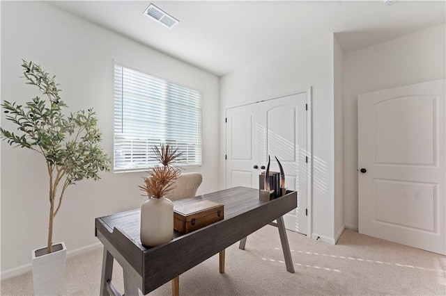 home office featuring light carpet