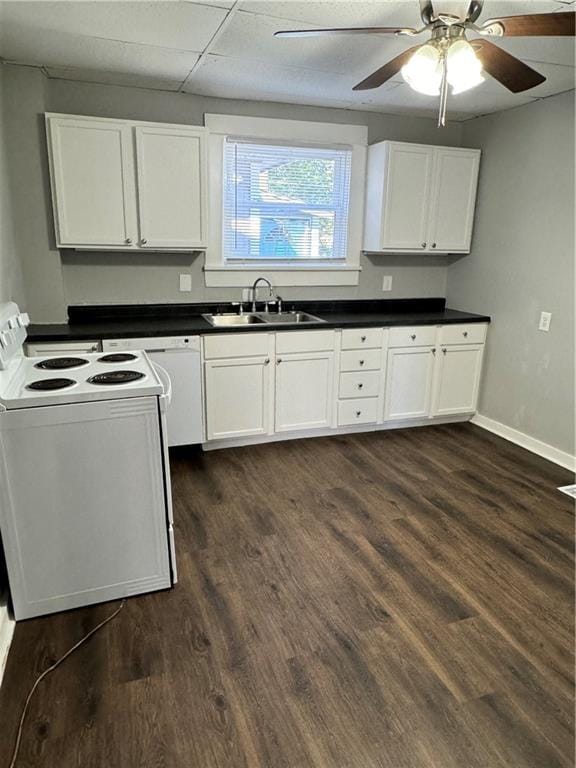 kitchen featuring white range with electric stovetop, sink, ceiling fan, dark wood-type flooring, and white cabinets