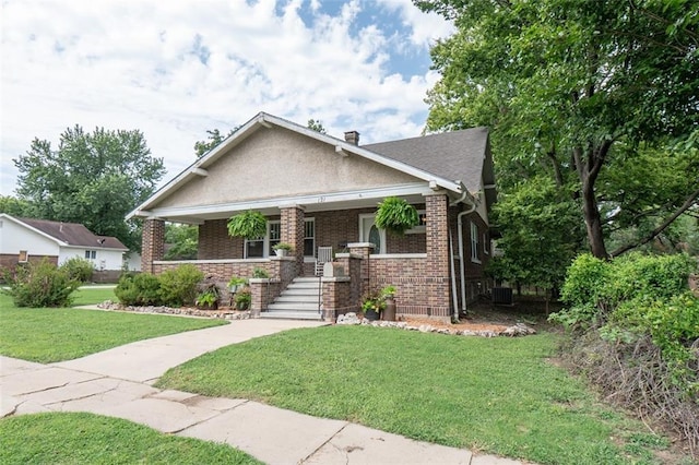 craftsman house featuring a front yard and a porch