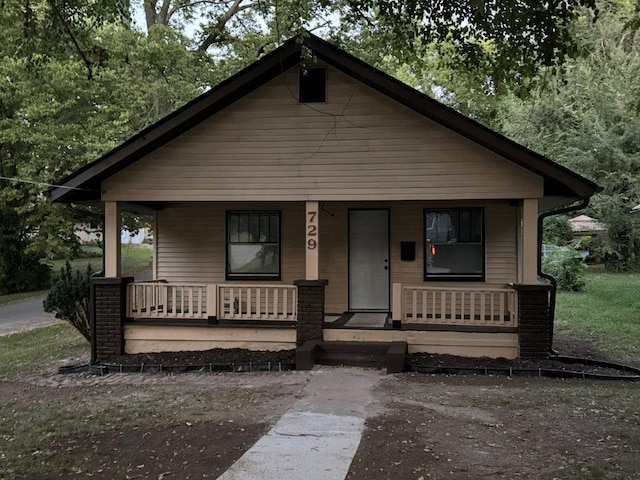 bungalow-style home with covered porch