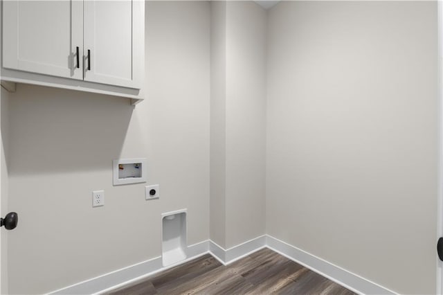 laundry area featuring washer hookup, cabinets, electric dryer hookup, and dark wood-type flooring