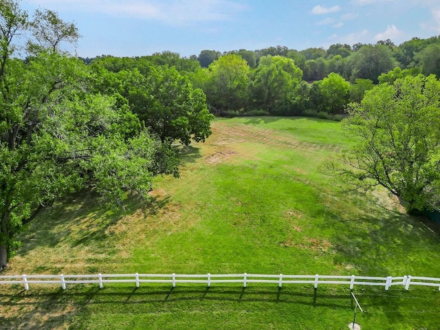 birds eye view of property featuring a rural view