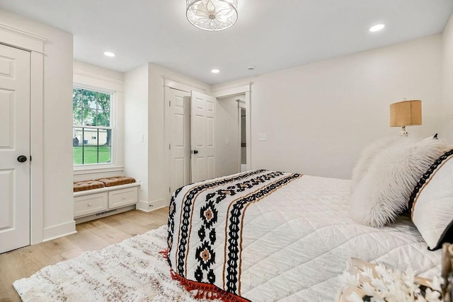 bedroom featuring light hardwood / wood-style floors