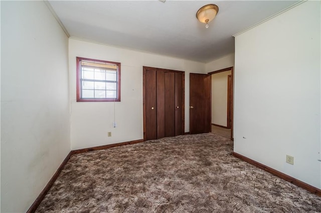 unfurnished bedroom with carpet flooring