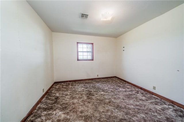 view of carpeted spare room