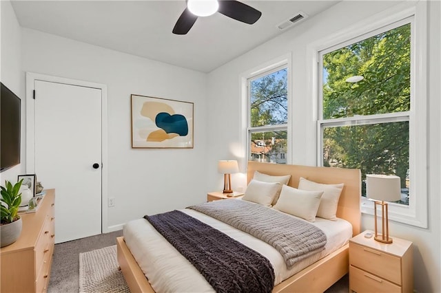 bedroom featuring ceiling fan and carpet floors