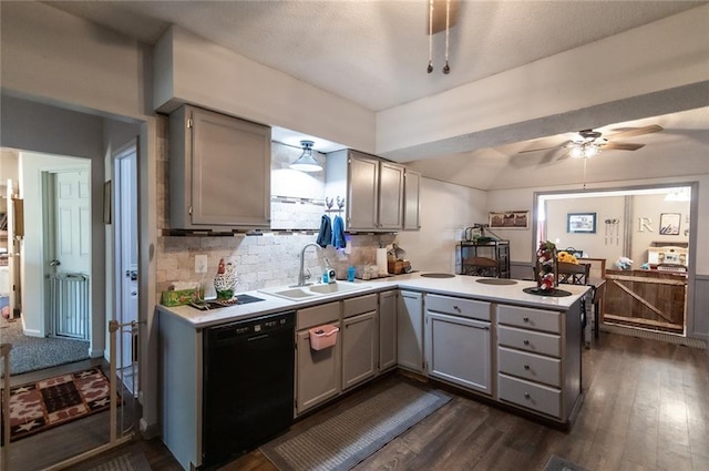 kitchen featuring gray cabinetry, ceiling fan, sink, dishwasher, and dark hardwood / wood-style floors