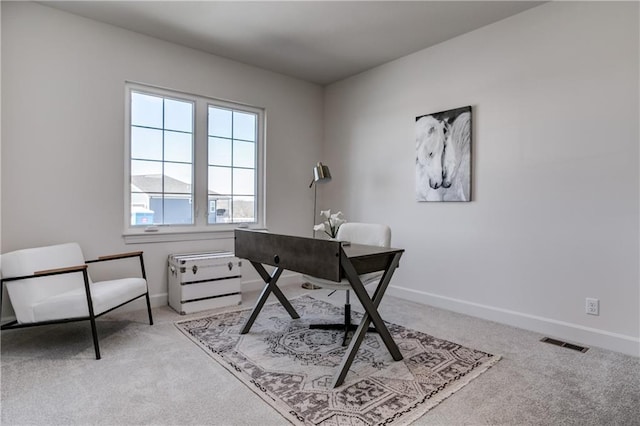 office area with light colored carpet