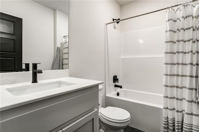 full bathroom with vanity, toilet, and shower / bath combo