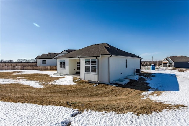 view of snow covered property