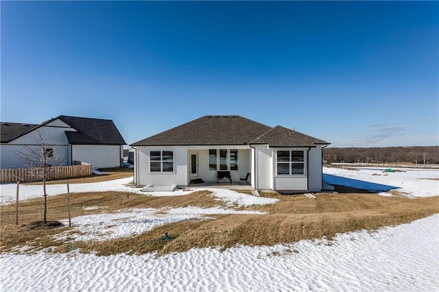 view of snow covered property