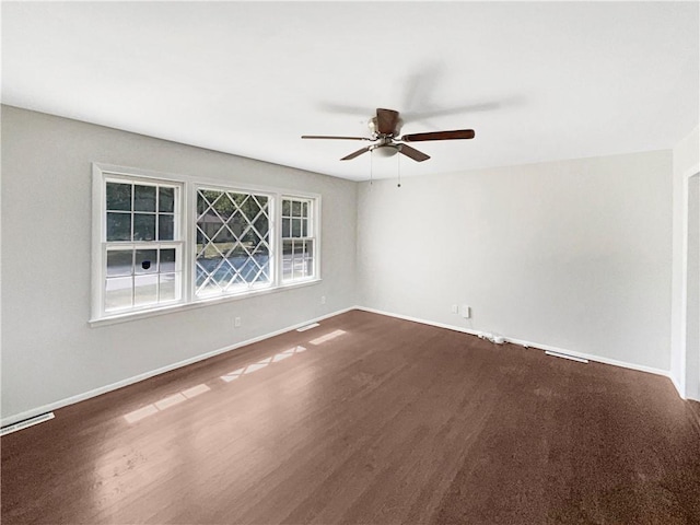 spare room featuring ceiling fan