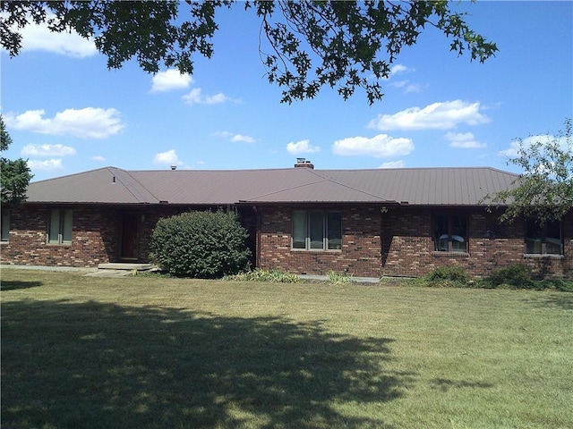 single story home with a front yard