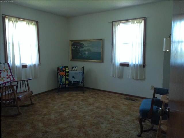 27061 Willow Dr, Paola, KS 66071 - living area with carpet floors and baseboards