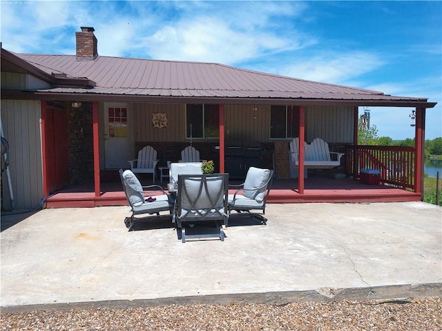 27061 Willow Dr, Paola, KS 66071 - view of patio / terrace with a deck and outdoor dining area