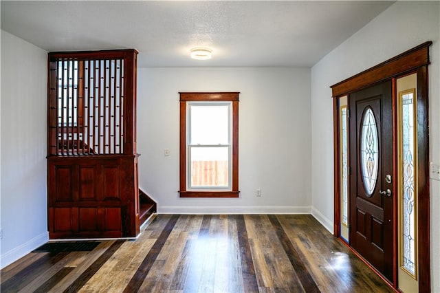 foyer featuring dark hardwood / wood-style floors