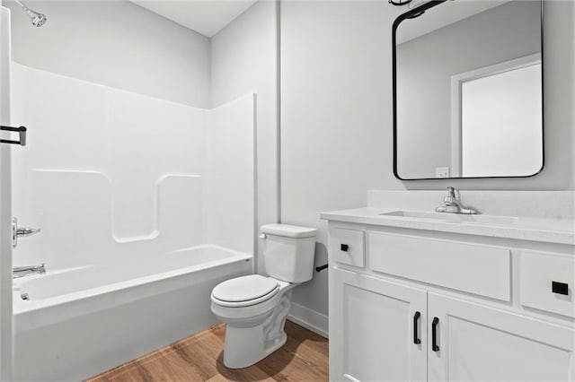 full bathroom featuring vanity, shower / bathtub combination, toilet, and wood-type flooring