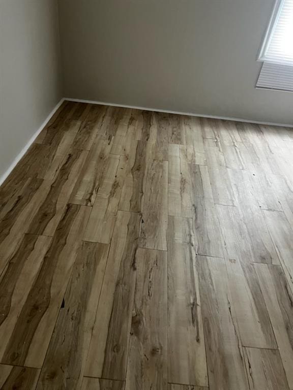 interior details featuring wood-type flooring