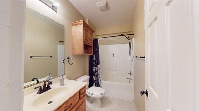 full bathroom featuring shower / bathtub combination with curtain, vanity, and toilet