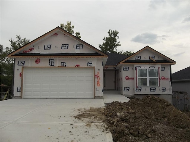 property under construction with a garage