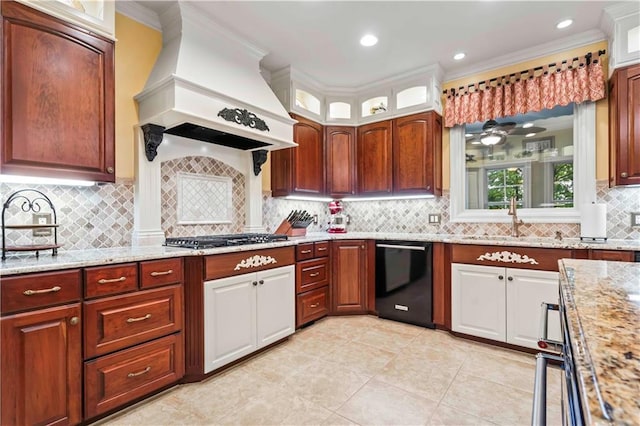 kitchen with stainless steel gas stovetop, dishwasher, light stone counters, premium range hood, and decorative backsplash