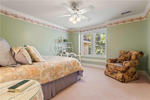 bedroom featuring crown molding, carpet flooring, and ceiling fan