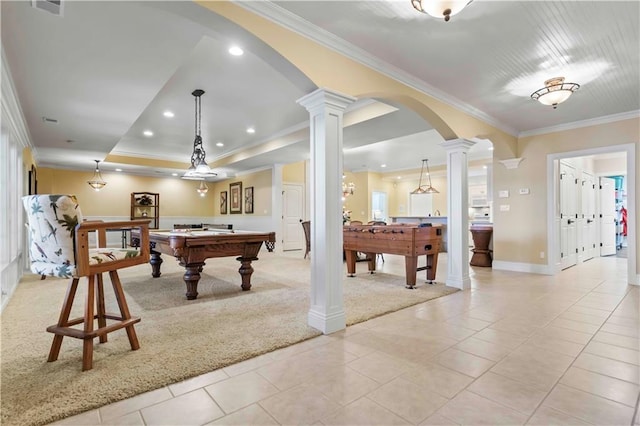 game room featuring a raised ceiling, pool table, decorative columns, ornamental molding, and light tile patterned flooring