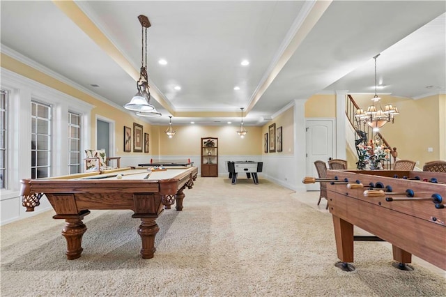 playroom with billiards, a raised ceiling, light carpet, and crown molding