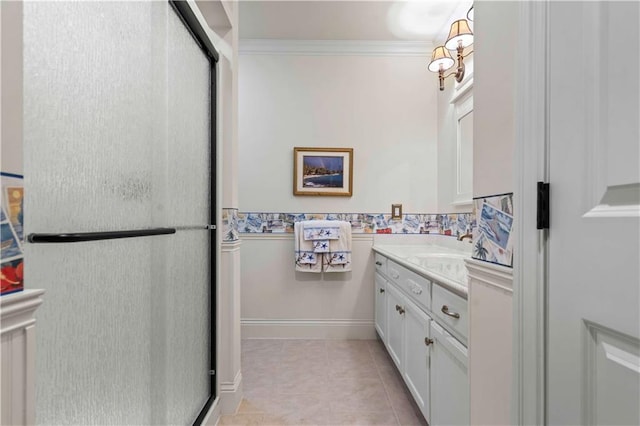 bathroom with crown molding, vanity, an enclosed shower, and tile patterned floors