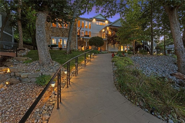 view of front of house with a balcony