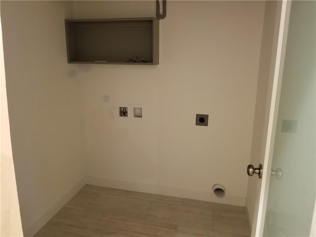 washroom with washer hookup, electric dryer hookup, and hardwood / wood-style flooring