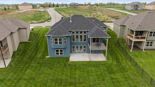 14574 Aurora Ln, Basehor, KS 66007 - rear view of property with a shingled roof, a patio area, and a residential view