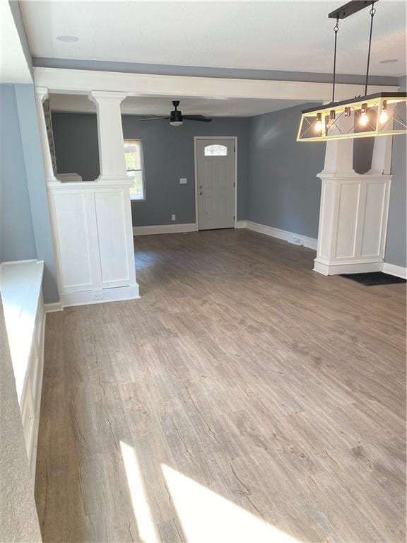 interior space featuring ceiling fan and hardwood / wood-style flooring