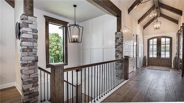 entryway featuring an inviting chandelier, dark hardwood / wood-style flooring, beam ceiling, french doors, and high vaulted ceiling