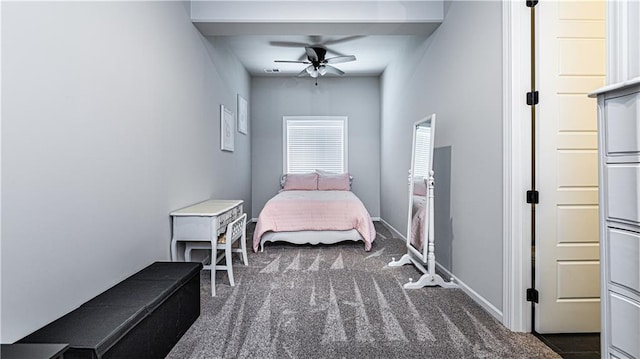 bedroom featuring dark carpet and ceiling fan