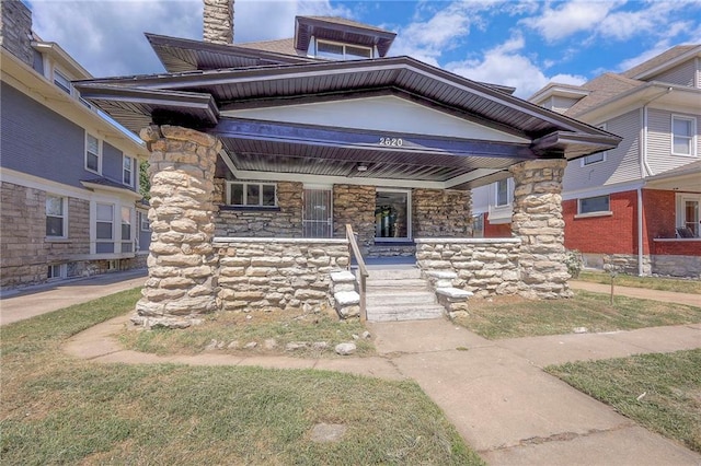 view of front of house with covered porch