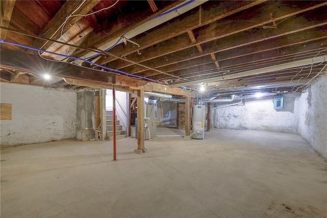 basement with gas water heater and electric panel