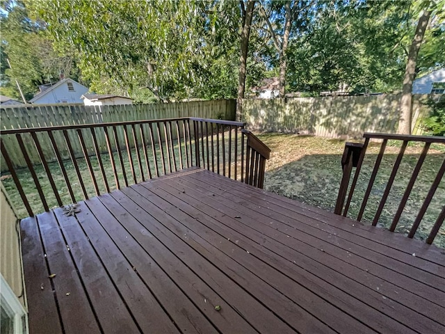 wooden deck with a yard