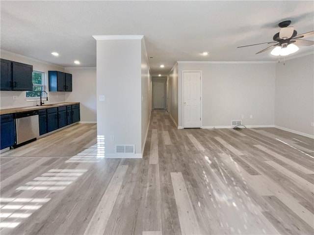 interior space with dishwasher, ceiling fan, ornamental molding, and light hardwood / wood-style flooring