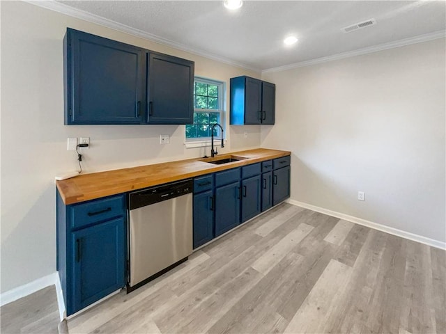 kitchen featuring light wood-type flooring, butcher block countertops, stainless steel dishwasher, and sink