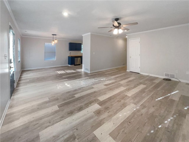 unfurnished living room featuring ceiling fan with notable chandelier, crown molding, and light hardwood / wood-style floors