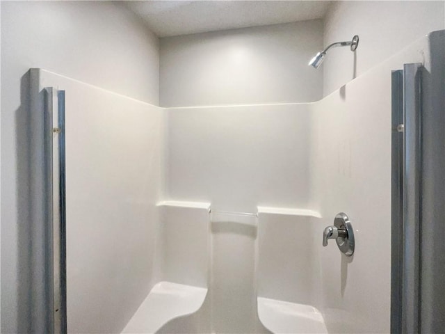 bathroom with a shower