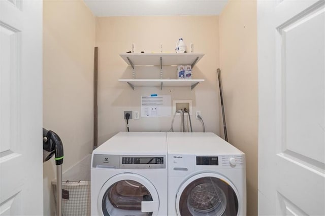 washroom featuring separate washer and dryer