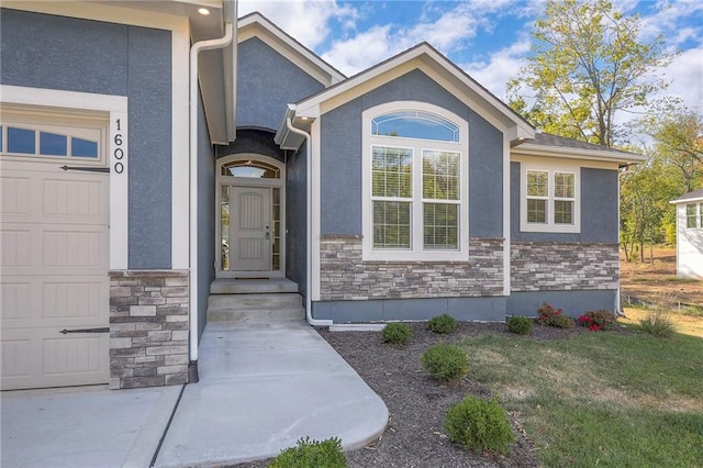 property entrance featuring a garage