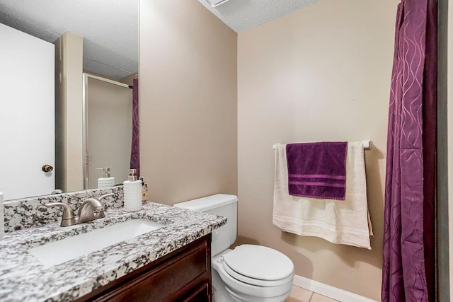 bathroom featuring tile patterned flooring, an enclosed shower, toilet, vanity, and a textured ceiling