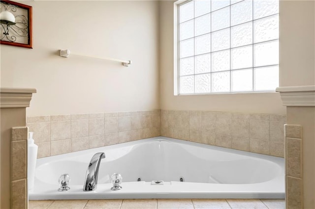 bathroom featuring tiled bath