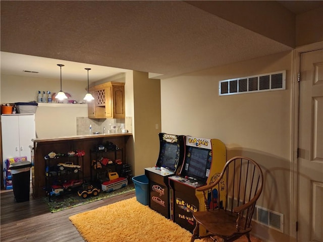 living area featuring dark hardwood / wood-style flooring