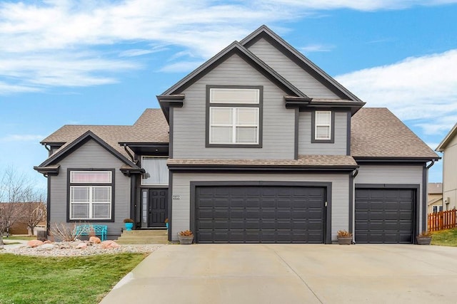 view of front of home with a garage