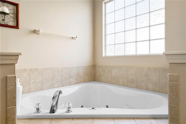 8500 NE 99th Ter, Kansas City, MO 64157 - bathroom featuring a relaxing tiled tub