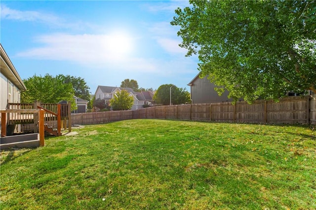 8500 NE 99th Ter, Kansas City, MO 64157 - view of yard featuring a deck